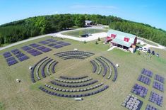 an aerial view of a farm with rows of lavenders arranged in the shape of a circle