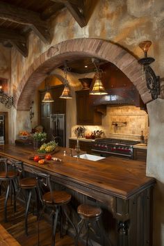 a large kitchen with an arched ceiling and wooden counter tops