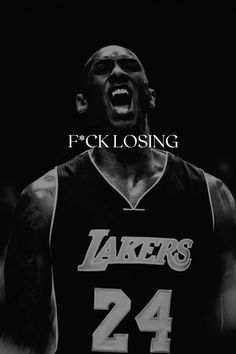 a black and white photo of a basketball player with the words f k losing on it