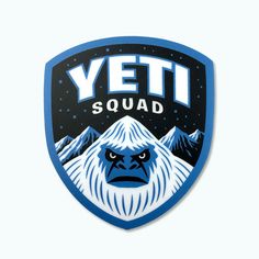 the yeti squad logo is shown in blue and white with an angry gorilla face