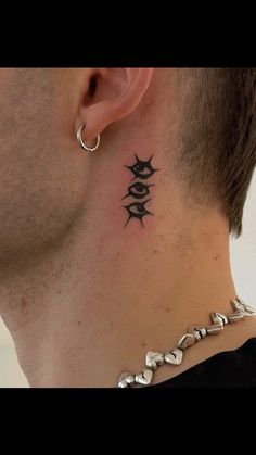 a man with a tattoo on his neck