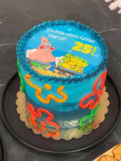 a spongebob themed birthday cake on a table