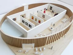 an architectural model of a house with lots of furniture and accessories on the ground floor