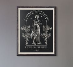 a black and white poster hanging on the wall