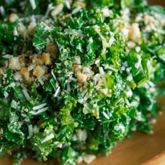 a close up of a plate of food with broccoli and cheese on it