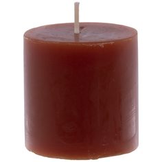 a brown candle with a wooden stick sticking out of it's center, on a white background