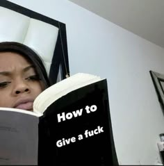 a woman is reading a book with the caption how to give a fock