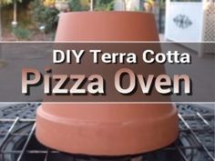 there is a pizza oven with a large cone on it's top and the words diy terra cota pizza oven above it