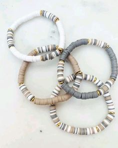 Clay Bead Bracelets - Etsy Cheap White Polymer Clay Beaded Bracelets, Neutral Beads Bracelets, Aztec Clay Bead Bracelet, Beaded Bracelets Neutral Colors, Colorful Heishi Bracelet, Neutral Jewelry Aesthetic, Flat Beaded Bracelet Ideas, Clay Bracelets Color Combos, Clay Bead Bracelet Ideas For Women