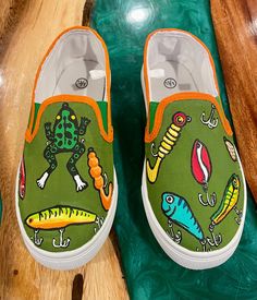 Hand painted fish lure sneakers. Message me for custom sneakers. I paint any character! *No returns as these are custom painted. Fish Lure, Painted Fish, Fishing Pole, Fish Painting, Custom Painted, Custom Sneakers, Sneakers Athletic, Custom Paint, Athletic Shoes