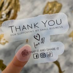 someone holding up a sticker that says thank you for supporting my small business