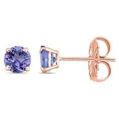 Every jewelry box needs at least one pair of stud earrings, and these gem-adorned beauties are sure to delight.  Crafted in lustrous 14 karat rose gold, this timeless, wear-with-everything design is elevated by exquisite, sparkling tanzanite gemstones. Let these be the studs you reach for when going on a date night, during the work week and wherever else life takes you. A superb addition to your jewelry collection.What is tanzanite?Tanzanite is a blue and violet variety of the mineral zoisite. I Jewelry Earings, Tanzanite Studs, Rose Gold Earrings Studs, Tanzanite Earrings, Tanzanite Stone, Rose Gold Studs, Peoples Jewellers, Solitaire Studs, Gemstone Stud Earrings