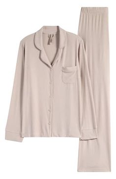 These essential PJs made from the brand's signature, stretchy modal rib bring relaxed comfort to your nighttime routine. 26" top length; 30" inseam; 22" leg opening; 11 1/2" front rise; 16" back rise (size Medium) Top has notched collar; long sleeves; chest patch pocket Pants have drawstring waist 91% modal, 9% spandex Machine wash, dry flat Imported Soft Cozy Pajamas, Luxury Pajamas For Women, Womens Pajamas Set, Skims Pjs, Cute Pjs Aesthetic, Skims Pajamas, Classy Loungewear, Sweater Lounge Set, Comfortable Pjs