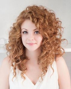 strawberry blonde woman, with medium long hair, curly with side part, wearing a white strappy top, and black eyeliner, haircuts for curly hair #shortcurlyhair Long Layered Curly Haircuts, Curly Red Hair, Long Curly Haircuts, Long Hairstyle, Medium Long Hair