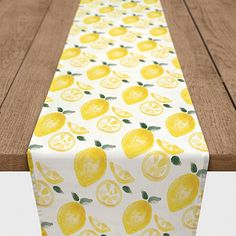 a table runner with lemons on it