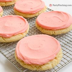 pink sugar cookies on a cooling rack with the words best copycat crumbl