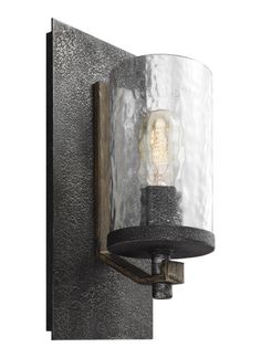 a wall light with a glass shade on it