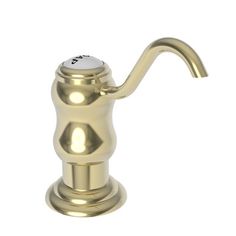 a brass colored faucet with a white knob