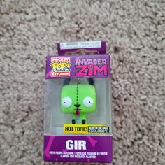 the inside of a box that has a green zombie figure in it's packaging