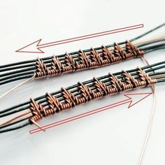 three different types of wires with arrows pointing to each other on a white table top