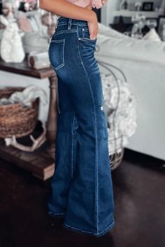 These jeans feature a unique asymmetric design with stylish distressed detailing. Size Chart (INCH) Sizes Hip Inseam Bottoms Waist Outseam Relax Relax Relax Relax Relax 6 36.4 31.7 21.5 27.8 42.1 8 37.4 31.9 22.0 28.7 42.5 10 38.4 32.1 22.6 29.7 42.9 12 40.0 32.3 23.5 31.5 43.3 14 41.5 32.4 24.4 33.3 43.7 16 43.5 32.6 25.5 35.2 44.1 18 45.5 32.7 26.6 37.4 44.5 Edgy Cowgirl, Womens Trouser Jeans, Distressed Flare Jeans, Estilo Country, Stretchy Jeans, Asymmetrical Design, Retro Inspired, Distressed Jeans, Flare Jeans