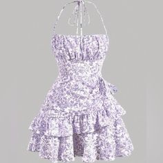 Floral Sundress Size Small. Brand New, Never Worn. Purple And White Design. Short Length Pastel Purple Casual Dress, Short Purple Dress Casual, White Ruffled Halter Neck Sundress, White Halter Neck Sundress With Ruffles, Cotton Ruffle Halter Neck Dress, Cotton Halter Neck Dress With Ruffles, Cotton Halter Neck Dress With Floral Print, Purple Cotton Mini Dress With Ruffles, Purple Simple Dress