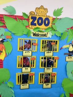 a bulletin board with pictures of zoo animals