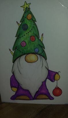 a drawing of a gnome with a christmas tree on his head