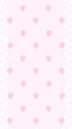 a pink and white wallpaper with strawberrys on the bottom right hand corner, as well as polka dots