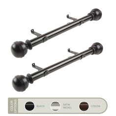 pair of black curtain rods on white background