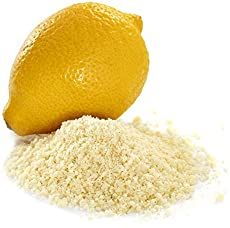 a pile of rice next to an orange on a white background with the image of a whole lemon