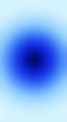 an abstract blue and white background with a circular shape in the center that is slightly blurry