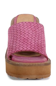 A shimmery woven strap adds a pop of color to a retro-chic sandal set on a stacked wedge heel. 3 1/4" heel; 1" platform Cushioned footbed Leather upper and lining/synthetic sole Imported Casual Wedge Sandals With Woven Sole And Block Heel, Synthetic Wedge Sandals With Woven Sole And Open Heel, Summer Wedge Sandals With Woven Leather, Summer Woven Leather Wedge Sandals, Casual Pink Sandals With Stacked Heel, Spring Pink Wedge Sandals With Woven Sole, Casual Woven Leather Wedge Heels, Woven Leather Open Toe Synthetic Wedge Sandals, Pink Synthetic Sandals With Woven Sole