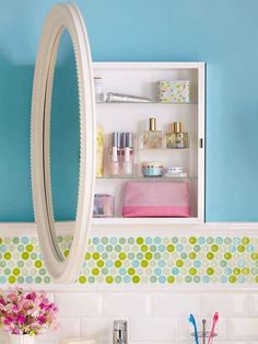 a bathroom sink under a mirror next to a shelf with cosmetics and other items on it