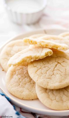 a white plate topped with cookies on top of a table