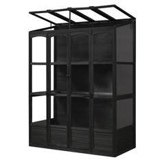 a black bookcase with glass doors on the front and bottom shelves, against a white background