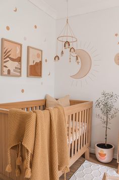 a baby's room decorated in neutral colors