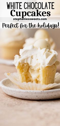 cupcakes with white frosting on a plate and text overlay that reads, how to make white chocolate cupcakes perfect for the holidays