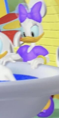 two cartoon characters in a bathtub with one ducky on the side and another ducky on the back