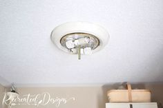 a ceiling light that is on in a room