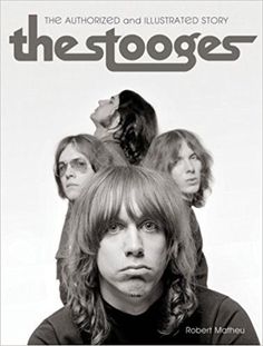 the stooges movie poster with an image of two women and one man in black shirt