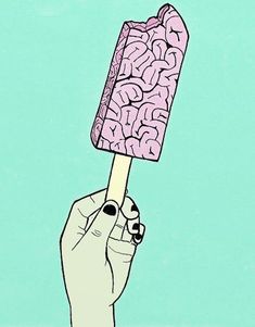 a hand holding an ice cream on top of a stick