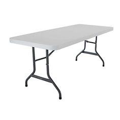 a white rectangular table with black legs on an isolated surface, viewed from the front