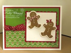 a close up of a greeting card with two gingerbreads on the front and back