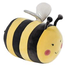 a yellow and black stuffed animal with a bee on it's back