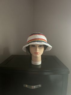 Hand crochet Rainbow bucket hat.  Crochet with 100% cotton yarn. Fits an average size head.  Gender neutral. Size: 21 x 8.5 Custom orders welcome. . White Adjustable Crochet Bucket Hat, Adjustable White Crochet Bucket Hat, Casual White Knitted Bucket Hat, White Yarn Bucket Hat With Short Brim, Casual Cotton Yarn Bucket Hat With Short Brim, White Brimmed Bucket Hat Made Of Yarn, White Brimmed Yarn Bucket Hat, Casual Bucket Hat With Short Brim In Cotton Yarn, Casual Cotton Yarn Beanie Hat