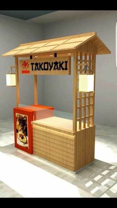 a small wooden kiosk sitting on top of a white floor