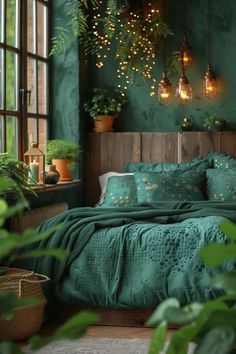 a bedroom with green walls and plants in the corner