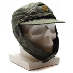 "Genuine Czech/Slovakian army camouflage cap M60 with metal insignia badge Czechoslovakian army issued model 1960's/1970's field cap. Similar to the east German NVA rain drop pattern camouflage Hat features button over the top ear flaps and adjustable chin strap Condition Like new, unused Shipping to United states, Canada, Europe * Economy shipping Shipping time : 7-21 working days or sometime more * Standard shipping with tracking information Shipping time : 7-14 working days or sometime more S Khaki Military Hat For Hunting, Military Style Khaki Hunting Hat, Khaki Military Style Hunting Hats, Military Style Baseball Cap For Outdoor, Military Cap For Hunting, Military Style Flat Cap In Khaki, Military Style Outdoor Hat, Green Military 5-panel Hat, German Hats