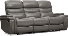 the reclining loveseat is shown in grey leather with studded trims